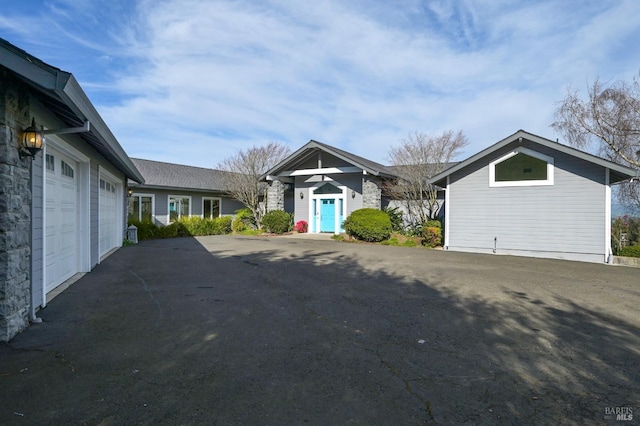 view of front of property featuring driveway