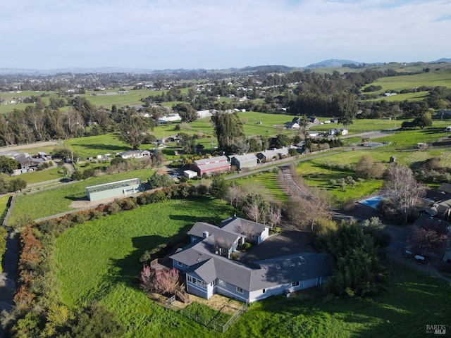 birds eye view of property featuring a rural view