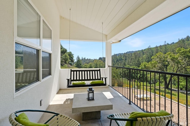 balcony with a forest view