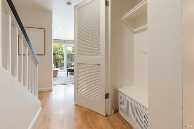 interior space featuring light wood finished floors and recessed lighting