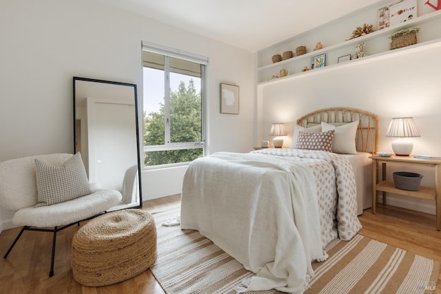 bedroom with light wood-style flooring