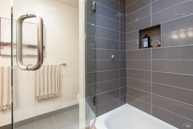 bathroom with toilet and shower / bathing tub combination