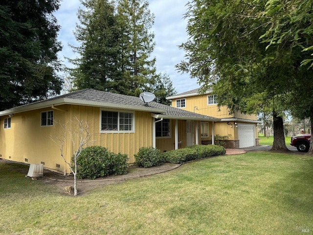 view of front of home featuring a garage, crawl space, a shingled roof, and a front lawn