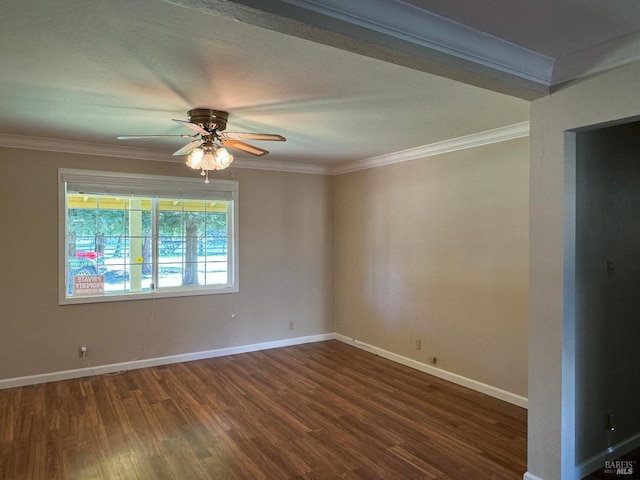 unfurnished room featuring ornamental molding, a ceiling fan, baseboards, and wood finished floors