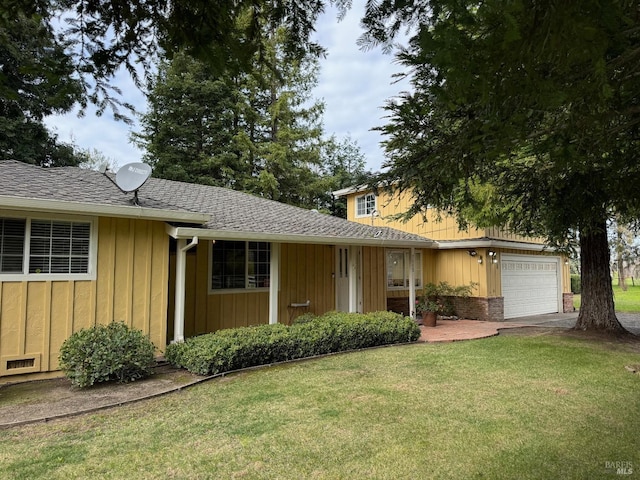 single story home with roof with shingles, a front lawn, board and batten siding, and an attached garage