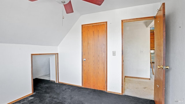 bonus room featuring baseboards, a ceiling fan, carpet, and vaulted ceiling