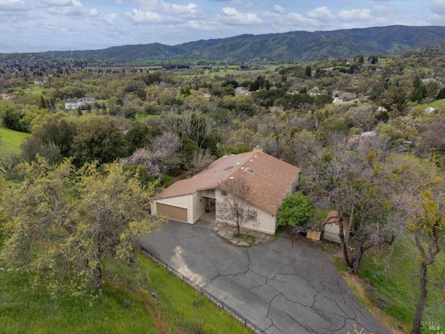 drone / aerial view featuring a mountain view