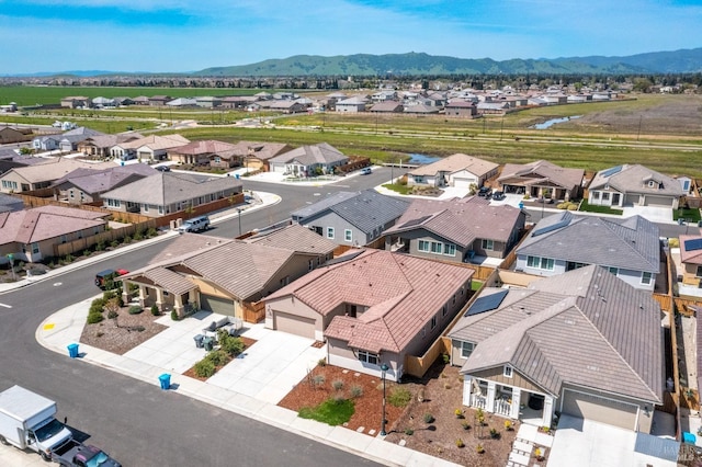 bird's eye view with a residential view and a mountain view