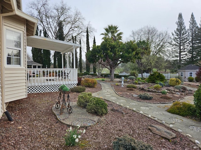 view of yard featuring a deck