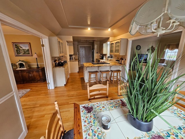 dining room with light wood-type flooring