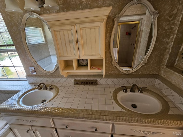 bathroom with tasteful backsplash and vanity