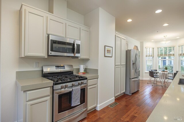 8 June Ct, Fairfax, CA 94930 - kitchen featuring stainless steel appliances, light countertops, recessed lighting, baseboards, and dark wood-style flooring