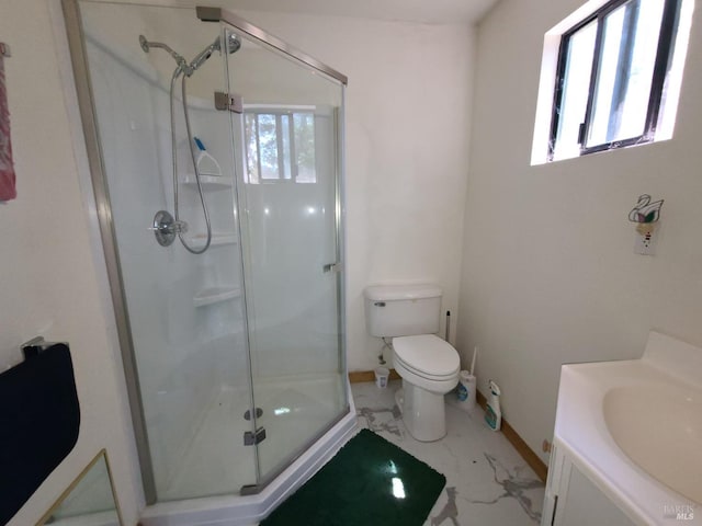 full bathroom with toilet, marble finish floor, a shower stall, and vanity