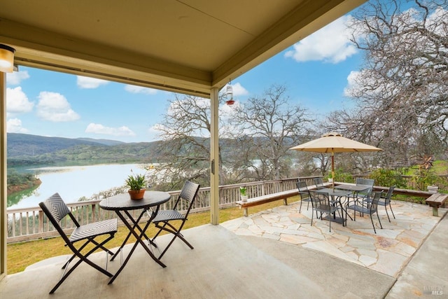 1011 Steele Canyon Rd, Napa, CA 94558 - view of patio with a water view and outdoor dining area
