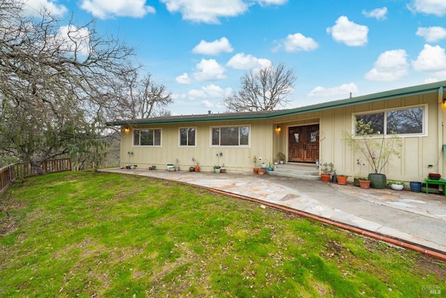 1011 Steele Canyon Rd, Napa, CA 94558 - rear view of property with board and batten siding and a patio