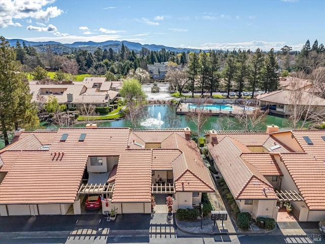 aerial view with a residential view and a water and mountain view