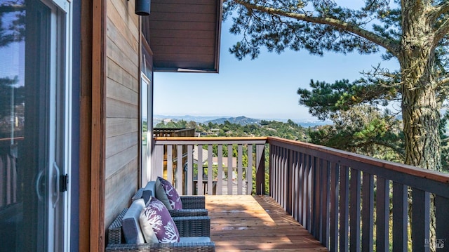 balcony with a deck with mountain view