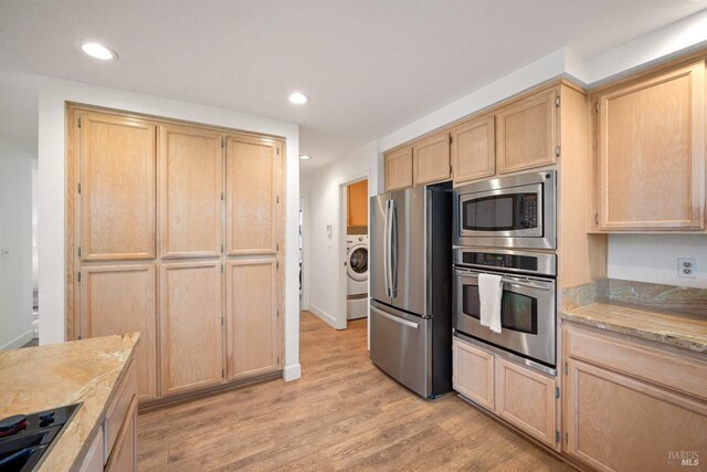 kitchen featuring appliances with stainless steel finishes, light wood-type flooring, light brown cabinets, and recessed lighting