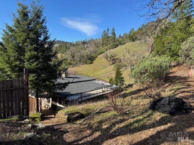 view of yard with fence