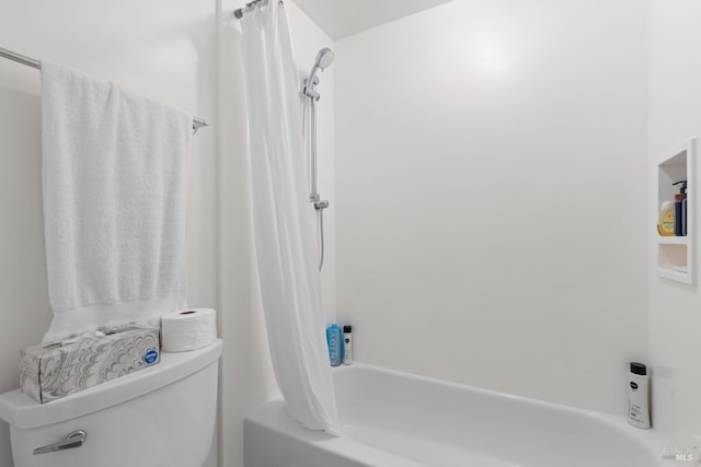 bathroom featuring toilet and shower / bathtub combination with curtain