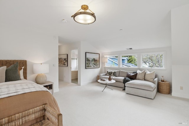 bedroom featuring carpet and baseboards