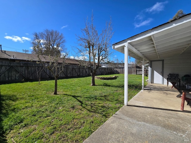 view of yard featuring a fenced backyard and a patio