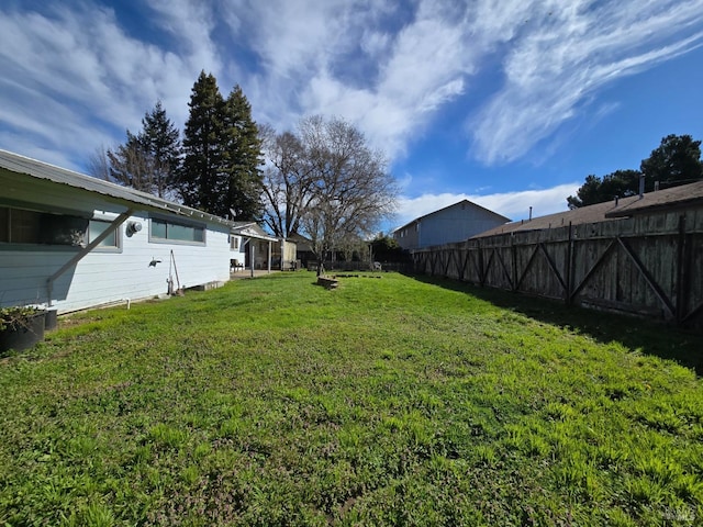 view of yard featuring fence