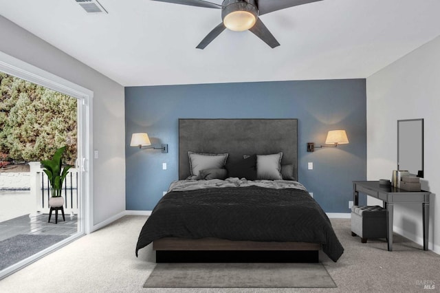 bedroom featuring baseboards, carpet flooring, visible vents, and access to exterior