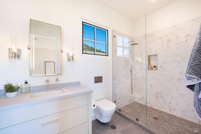 full bathroom featuring a marble finish shower, vanity, toilet, and tile patterned floors