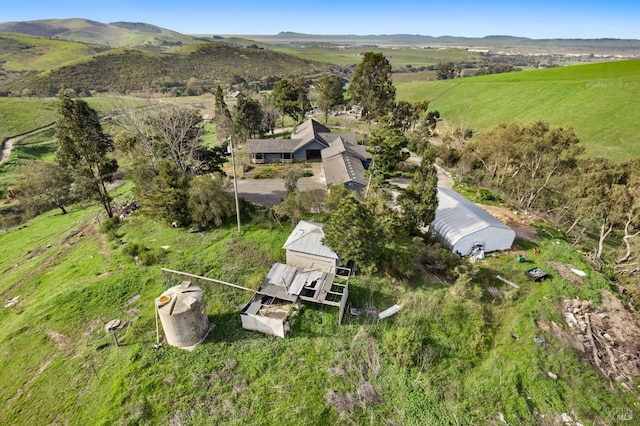 bird's eye view featuring a rural view and a mountain view