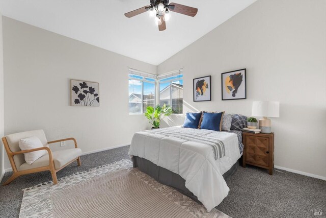 bedroom featuring vaulted ceiling, carpet, baseboards, and ceiling fan