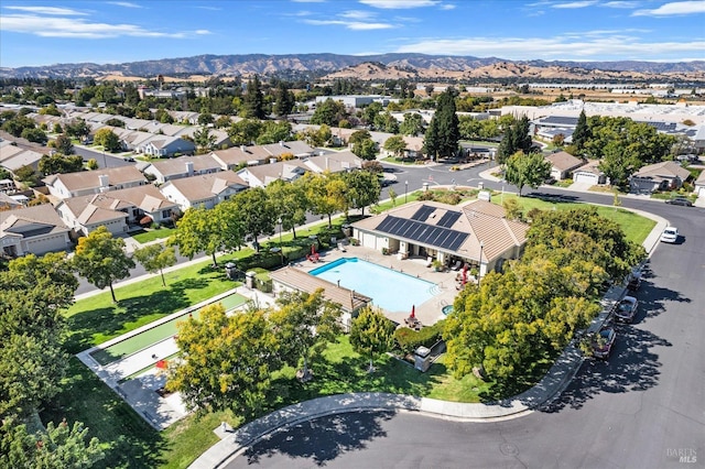 aerial view featuring a mountain view and a residential view