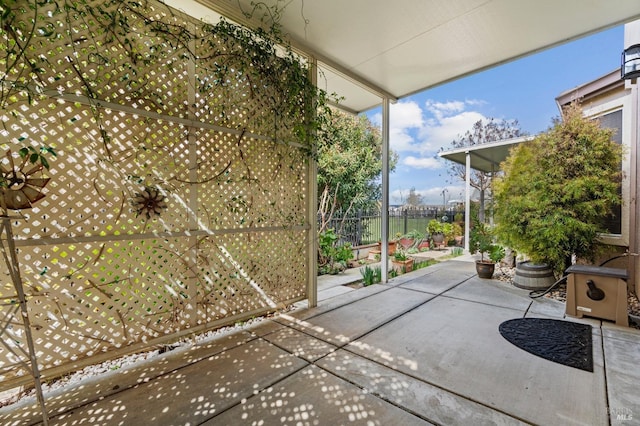 view of patio / terrace featuring fence