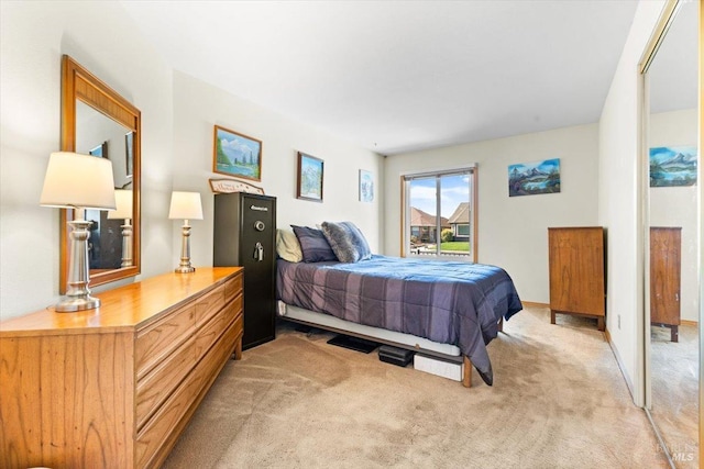 bedroom with light carpet