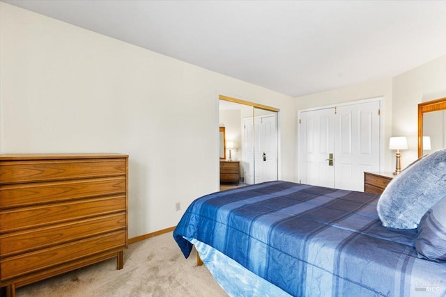 bedroom with baseboards and carpet flooring