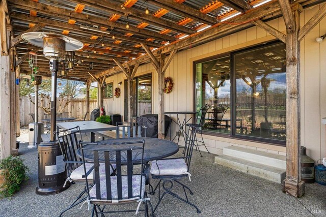 view of patio / terrace with fence and outdoor dining area