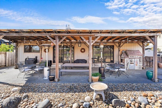 view of patio / terrace featuring fence