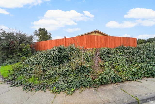 view of yard featuring fence