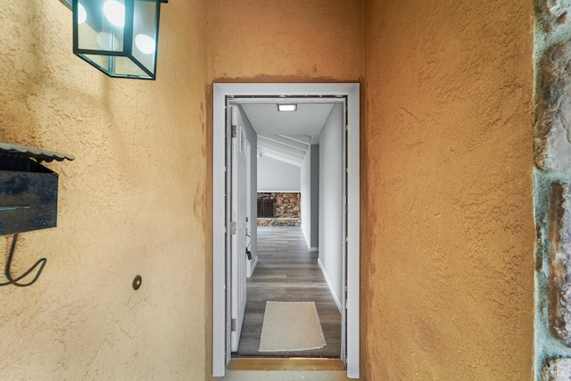 property entrance featuring stucco siding