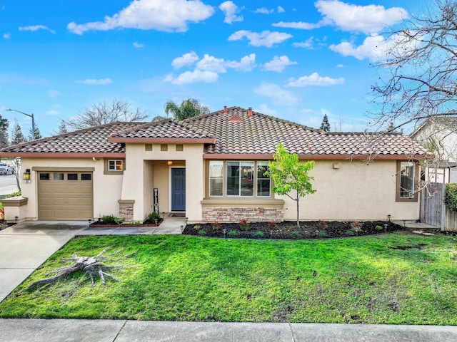 mediterranean / spanish house with a garage, driveway, a tiled roof, a front lawn, and stucco siding