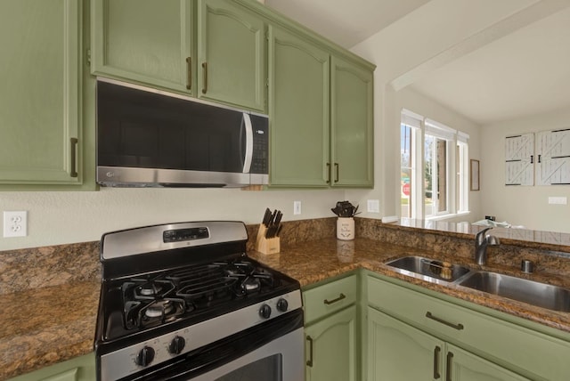 kitchen with green cabinetry