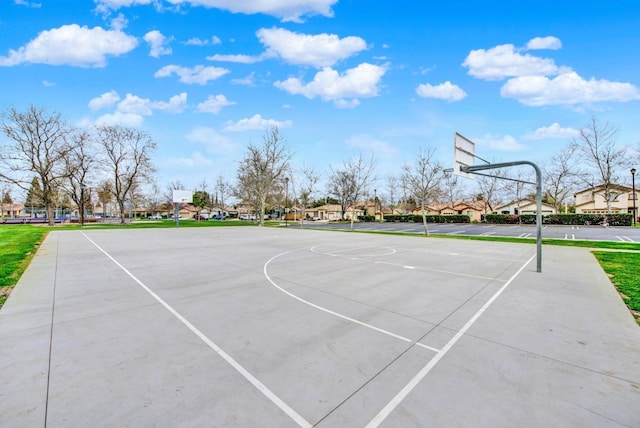 view of sport court with community basketball court and a residential view