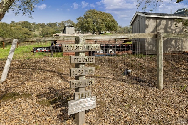 exterior details featuring fence