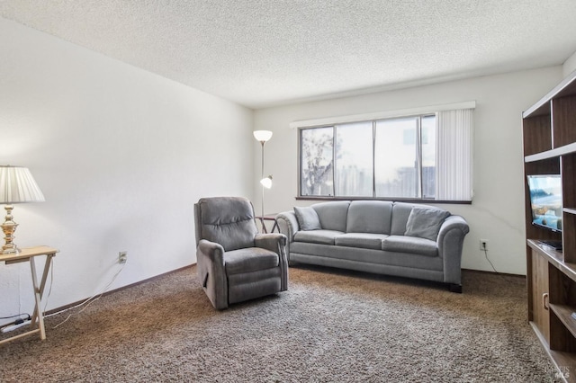 living room featuring a textured ceiling and carpet floors