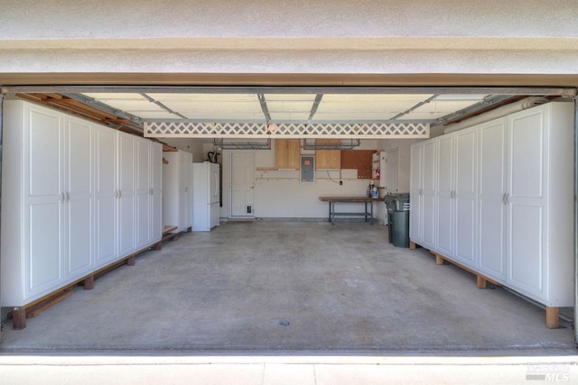 garage featuring electric panel