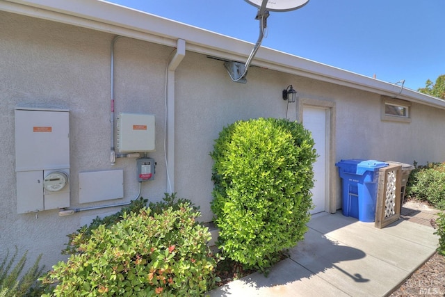 exterior space featuring stucco siding