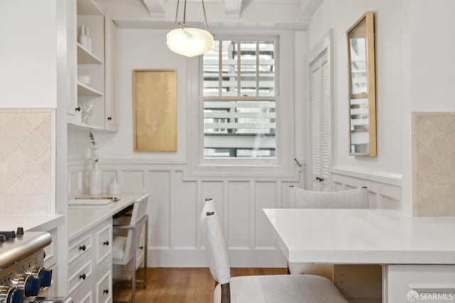 2401 Jackson St Unit 3, San Francisco, CA 94115 - bathroom featuring a decorative wall, wood finished floors, and a wainscoted wall