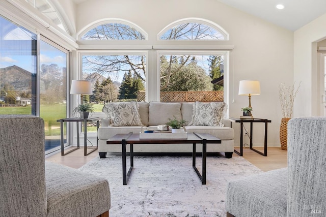 sunroom / solarium with lofted ceiling