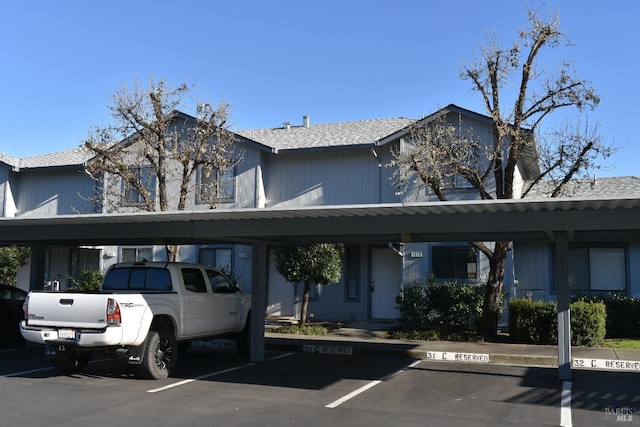 view of front of house with covered parking