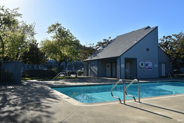 community pool with fence